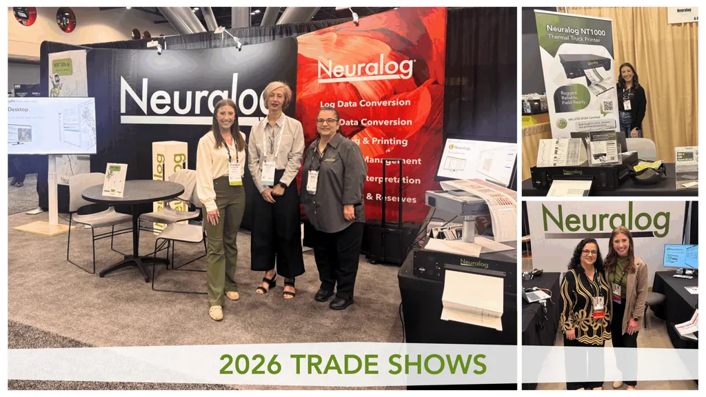 The Neuralog team at the Neuralog trade show booth in 2026, with the Neuralog NT1000 thermal truck printer on display